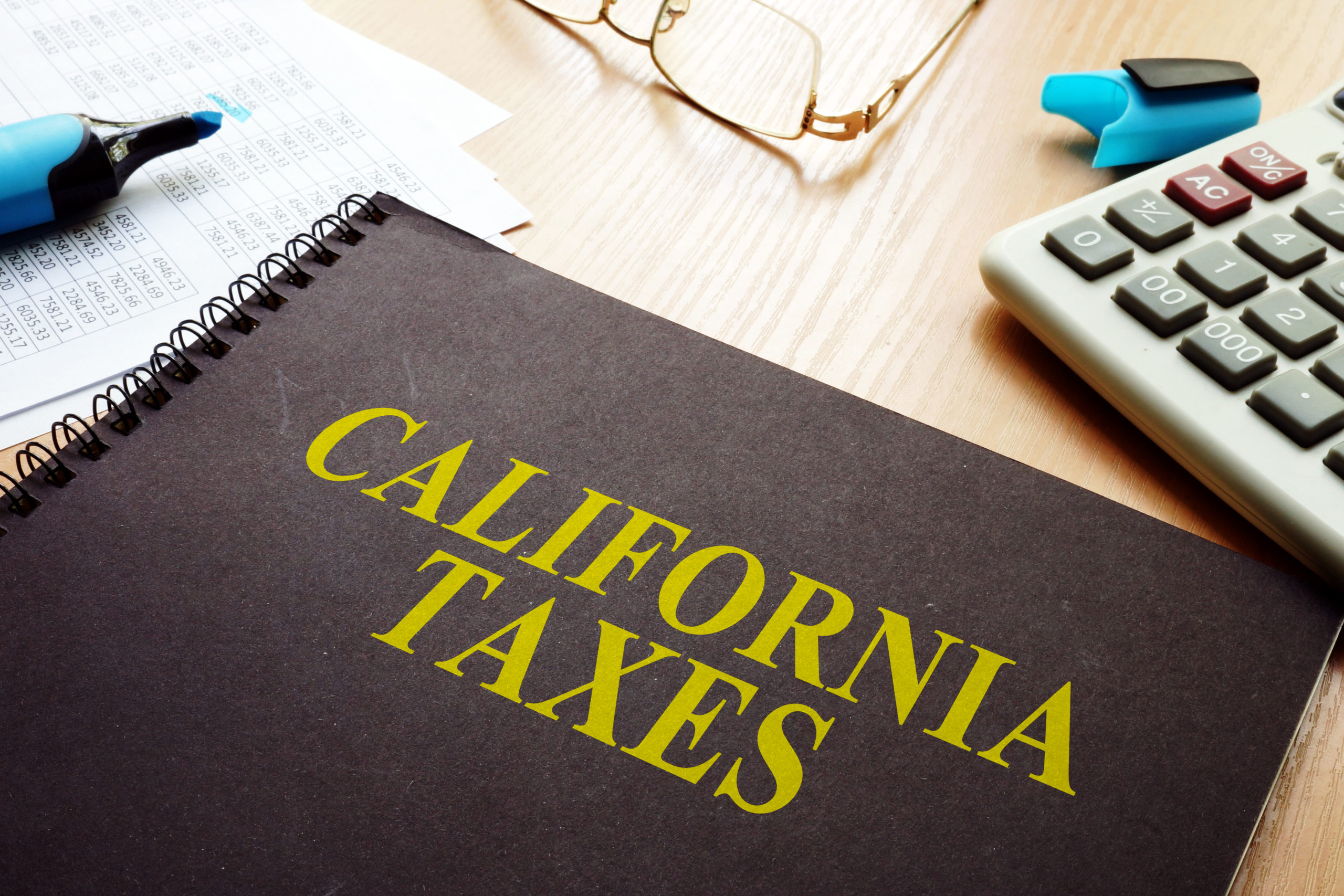 Book that contains the benefits of the California Earned Income Tax Credit - Rush Tax Resolution